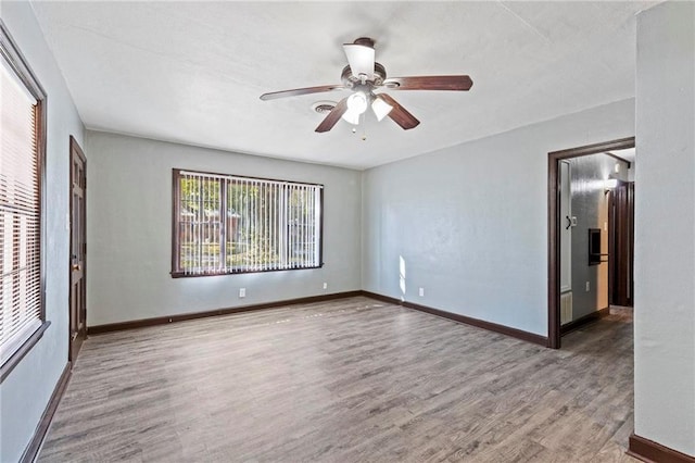 interior space with hardwood / wood-style flooring and ceiling fan