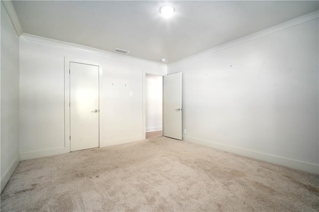 3655 Old Shell Rd Unit 121, Mobile, AL 36608 - unfurnished room featuring crown molding and light carpet