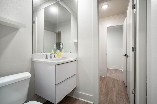 3655 Old Shell Rd Unit 121, Mobile, AL 36608 - half bathroom featuring wood finished floors and vanity