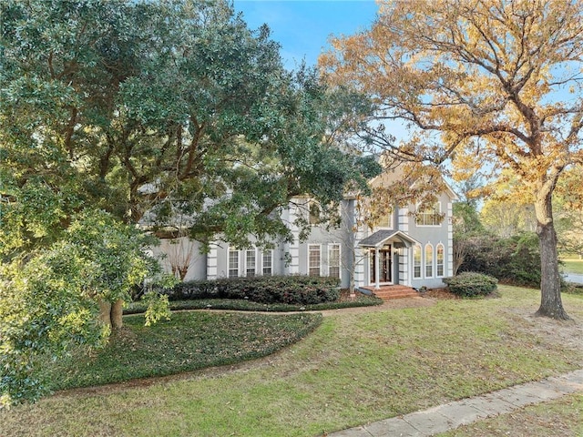 view of front of property with a front lawn