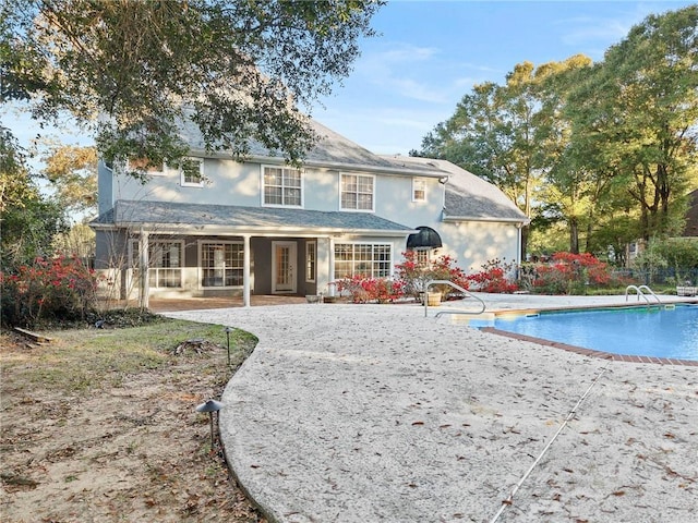 rear view of house with a patio