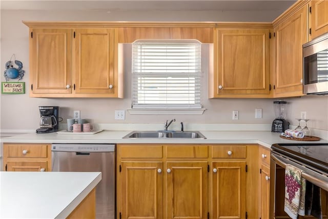 2354 Island Shores Dr, Dauphin Island, AL 36528 - kitchen featuring light countertops, appliances with stainless steel finishes, and a sink