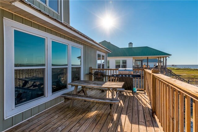 2354 Island Shores Dr, Dauphin Island, AL 36528 - deck with area for grilling and a water view