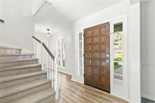 foyer entrance featuring hardwood / wood-style flooring