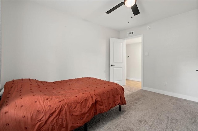 254 Fairford Rd, Calvert, AL 36513 - bedroom with light colored carpet and ceiling fan