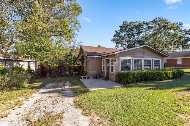 exterior space featuring a front lawn