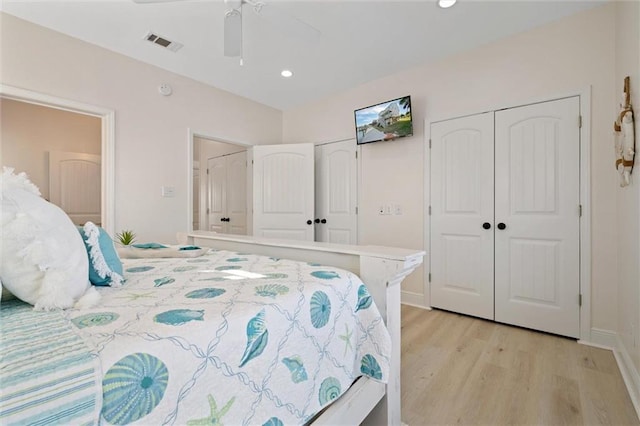 bedroom featuring light wood-type flooring and ceiling fan