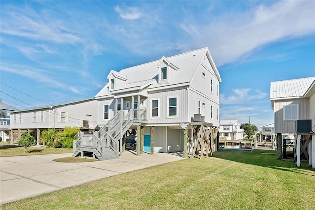 back of property with a yard and central air condition unit