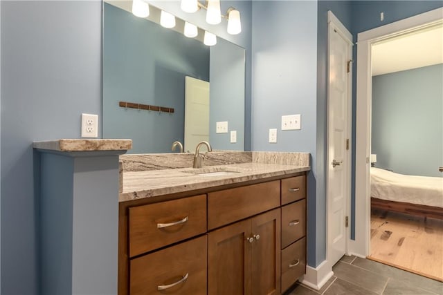 bathroom featuring vanity and wood-type flooring