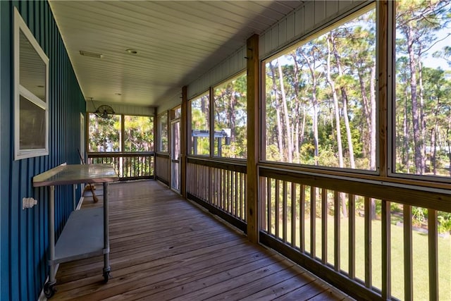 unfurnished sunroom with plenty of natural light