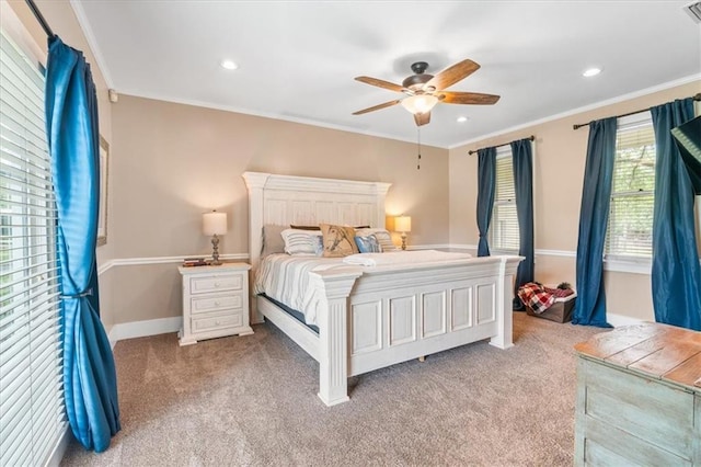 carpeted bedroom with recessed lighting, a ceiling fan, visible vents, baseboards, and ornamental molding