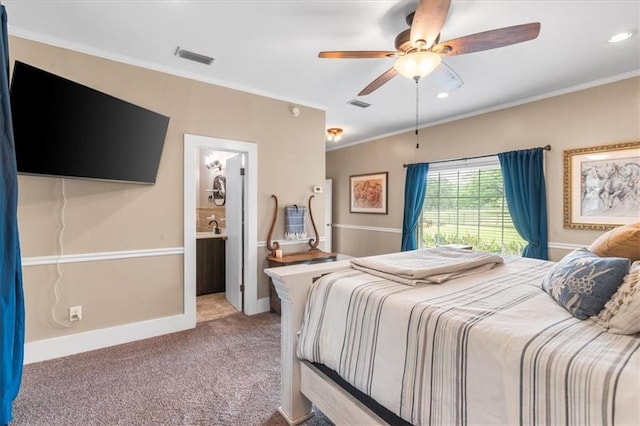 carpeted bedroom featuring visible vents, ceiling fan, crown molding, and recessed lighting