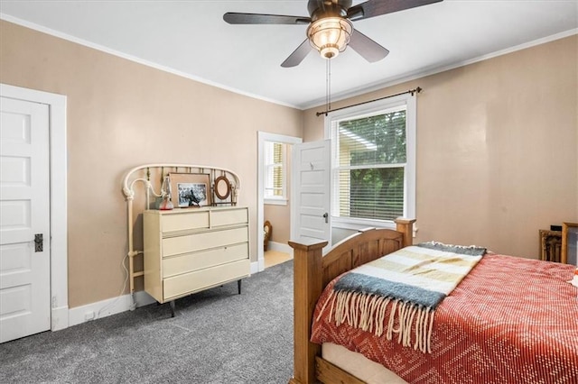 bedroom featuring crown molding, carpet flooring, ceiling fan, and baseboards