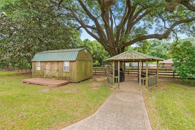 view of shed featuring fence