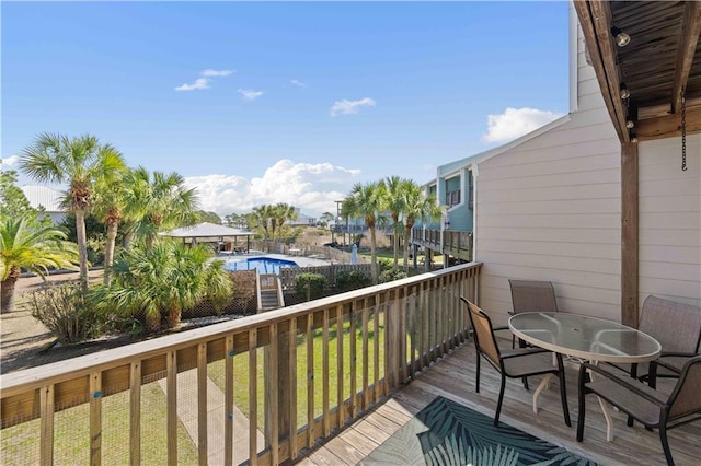 wooden balcony featuring a deck