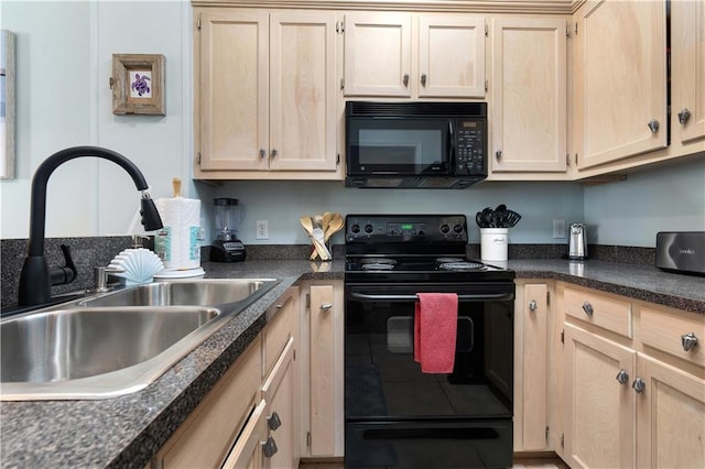 kitchen with light brown cabinets, black appliances, and sink