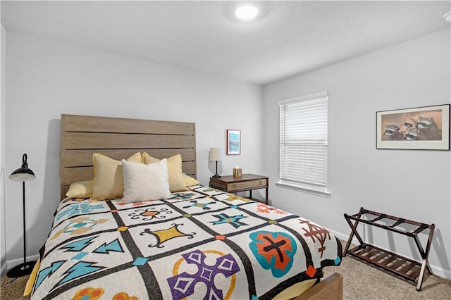 bedroom with light colored carpet