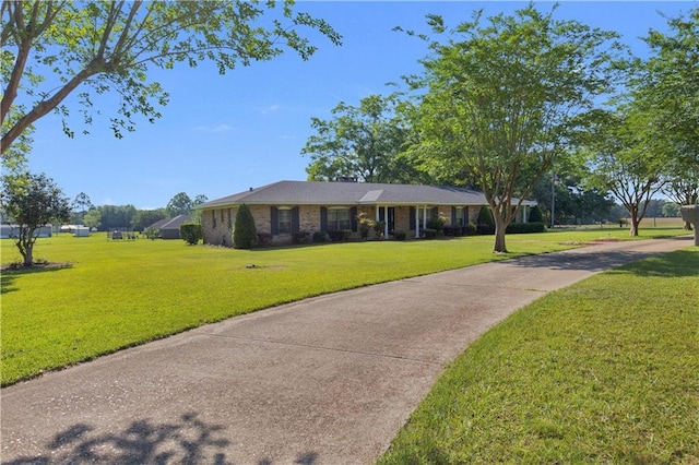 720 Grand Bay-Wilmer Rd N, Mobile, AL 36608 - ranch-style house with a front lawn and concrete driveway