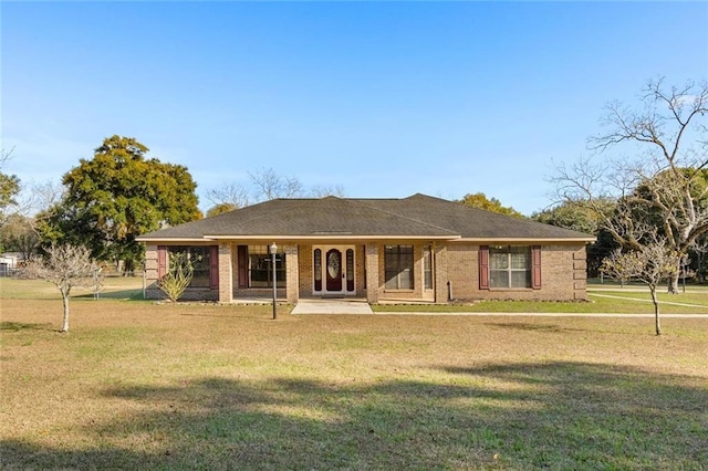 single story home with a front yard