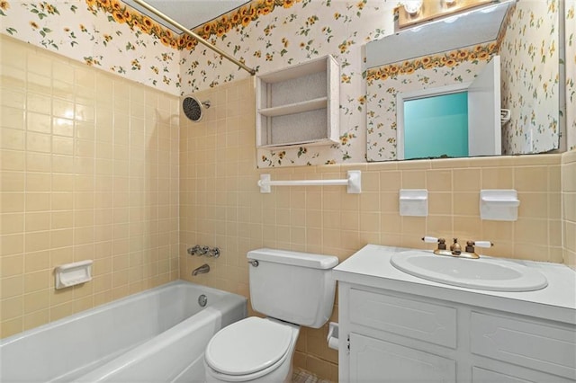 full bathroom featuring toilet, a wainscoted wall, vanity, bathtub / shower combination, and wallpapered walls