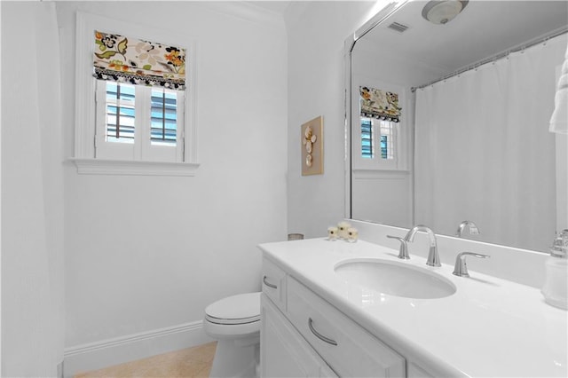 bathroom featuring tile patterned flooring, vanity, toilet, baseboards, and visible vents