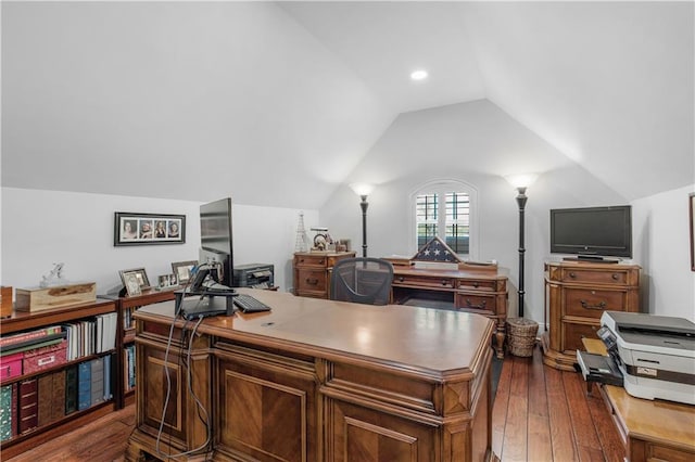 home office featuring lofted ceiling and dark wood finished floors