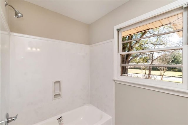 bathroom featuring bathing tub / shower combination