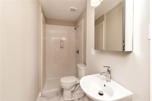 bathroom with visible vents, a shower, toilet, marble finish floor, and a sink