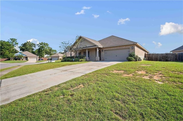 ranch-style home with a front yard and a garage