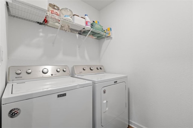 laundry room with washer and clothes dryer