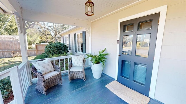 doorway to property featuring a porch