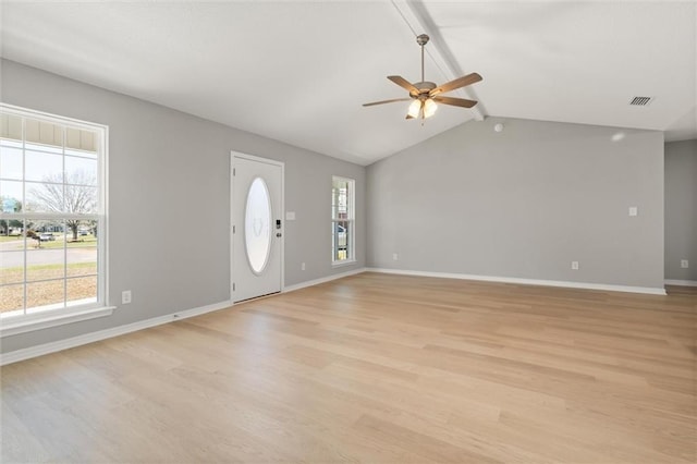 entrance foyer with light wood-type flooring, plenty of natural light, and baseboards