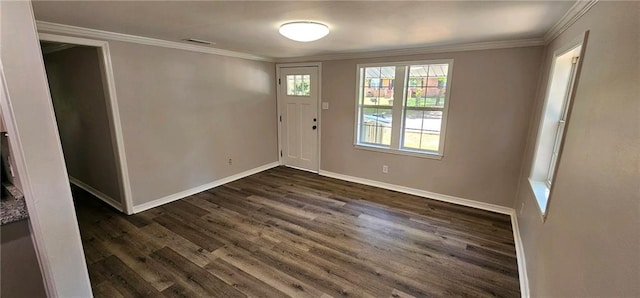 interior space with crown molding and dark wood-type flooring