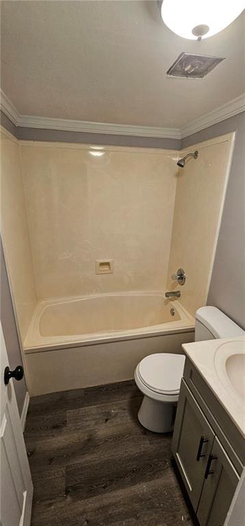 full bathroom featuring toilet, ornamental molding, shower / bathtub combination, vanity, and hardwood / wood-style flooring