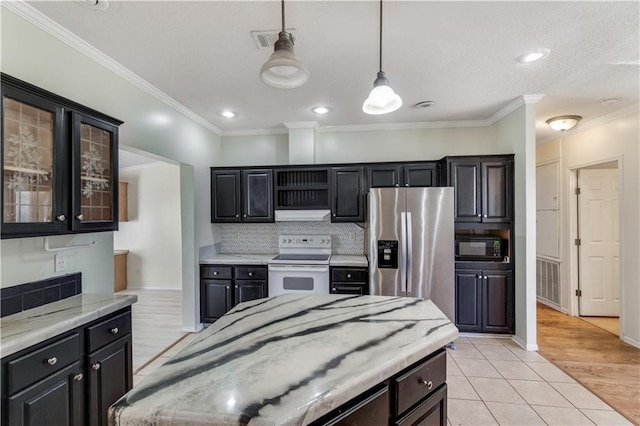 kitchen with black microwave, electric range, visible vents, stainless steel refrigerator with ice dispenser, and pendant lighting