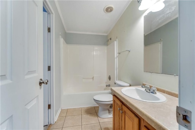 bathroom featuring tile patterned flooring, toilet, vanity, tub / shower combination, and crown molding