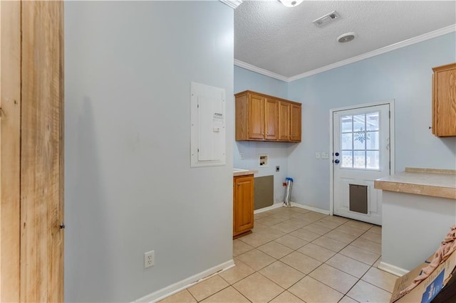 laundry room with hookup for a washing machine, visible vents, cabinet space, electric panel, and electric dryer hookup