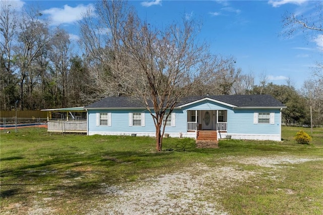 view of front of property featuring a porch and a front lawn