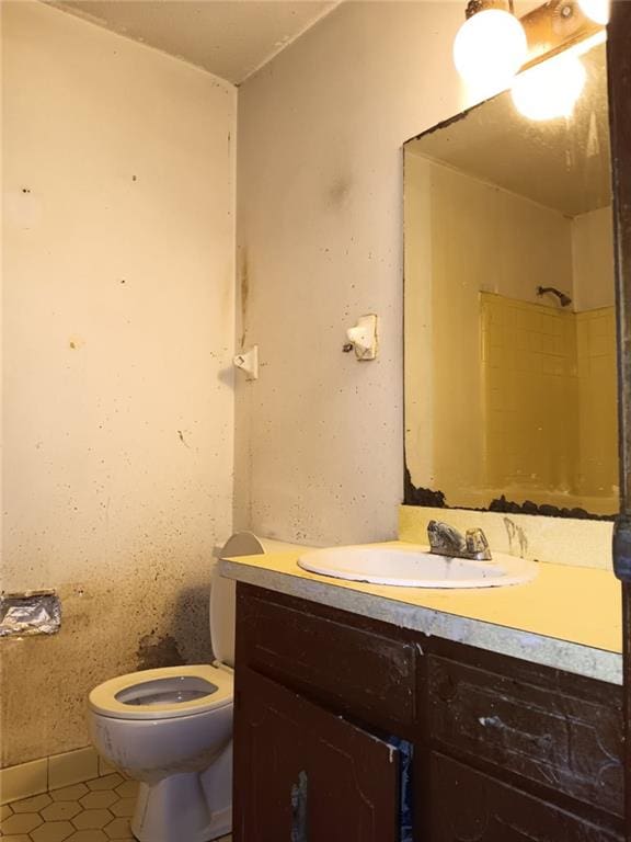 609 Gehrig Ave, Prichard, AL 36610 - full bathroom featuring vanity and tile patterned flooring