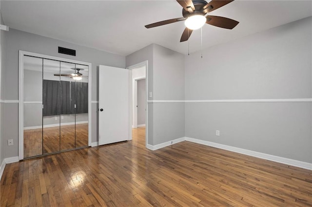 409 Byron Ave E, Mobile, AL 36609 - unfurnished bedroom with hardwood / wood-style floors, a ceiling fan, and a closet