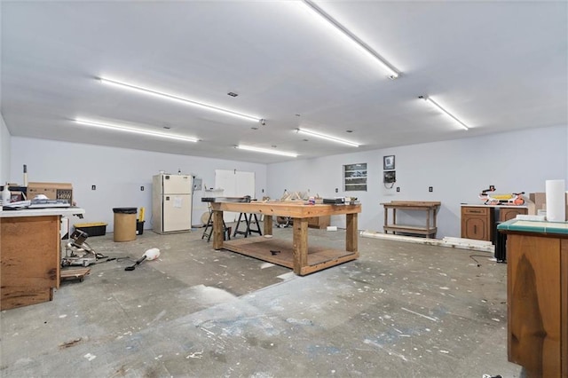 409 Byron Ave E, Mobile, AL 36609 - miscellaneous room featuring a workshop area and concrete flooring