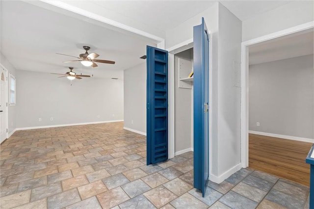 409 Byron Ave E, Mobile, AL 36609 - unfurnished room with ceiling fan and light stone finish flooring