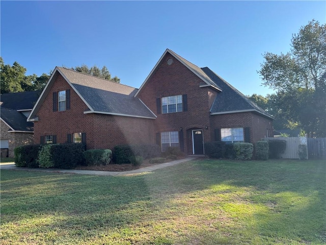 view of front of property with a front lawn