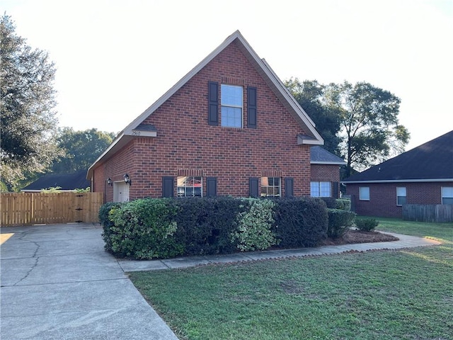 view of home's exterior featuring a lawn