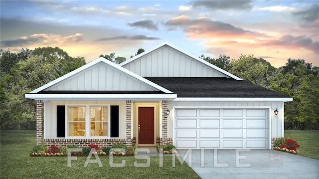 10570 Relic Rd S, Mobile, AL 36608 - view of front of house featuring board and batten siding, roof with shingles, concrete driveway, and a lawn