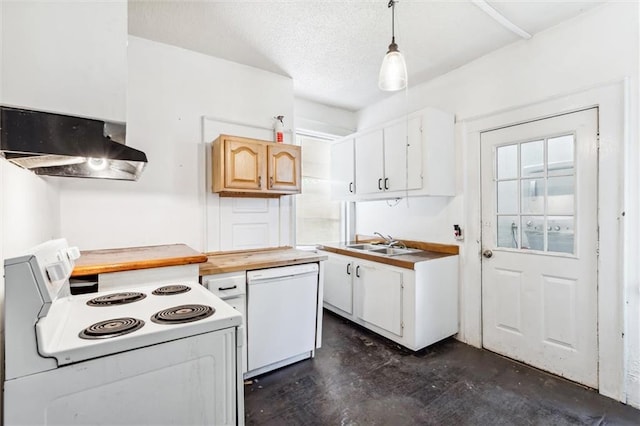 kitchen featuring white appliances, white cabinetry, decorative light fixtures, and sink