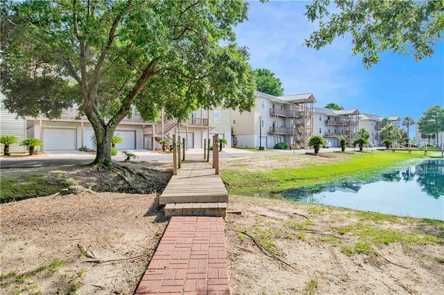 view of home's community featuring a water view