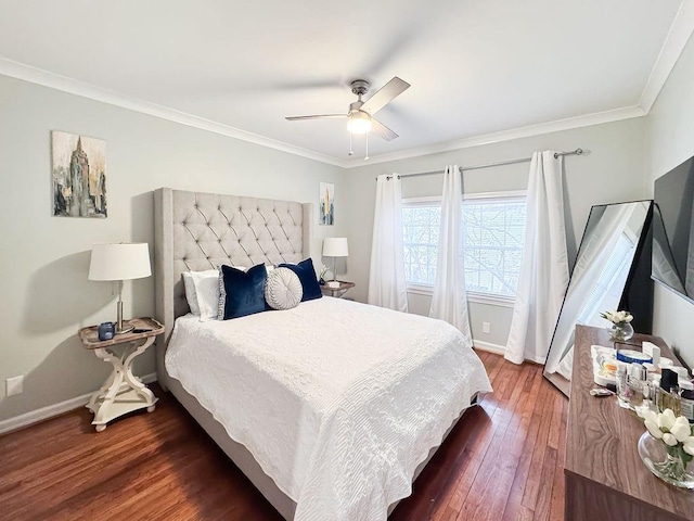 bedroom with ornamental molding, hardwood / wood-style flooring, baseboards, and ceiling fan