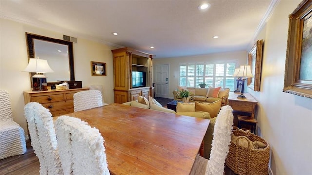 4009 Old Shell Rd Unit D13, Mobile, AL 36608 - dining room with hardwood / wood-style flooring and crown molding