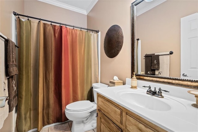 bathroom featuring tile patterned floors, crown molding, vanity, and toilet